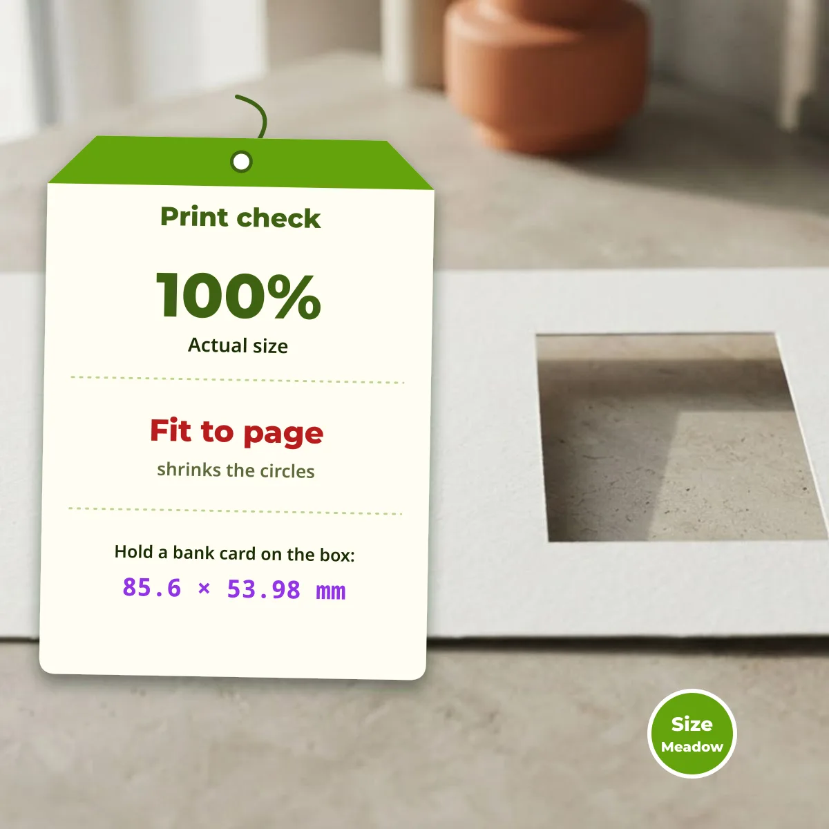 Why a printout can be off scale: Fit to page shrinks the circles, so check the 85.6 by 53.98 mm card box at 100 percent